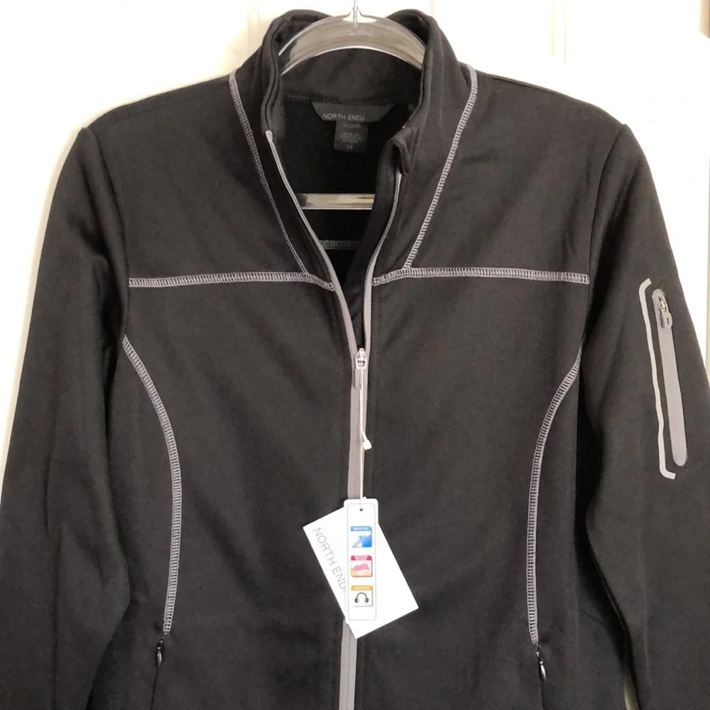 New Women’s North End lightweight jacket.  Size S.  Reflective strips. Black.